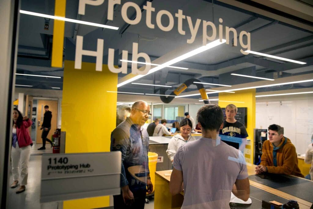 students and staff in the prototyping hub